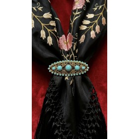 Broche piedras brocado metal